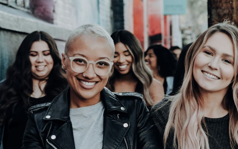 A group of young friends smiling together